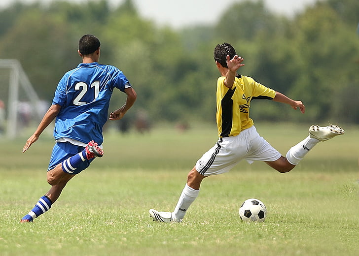 Royalty-Free photo: Two man playing soccer during daytime - PickPik