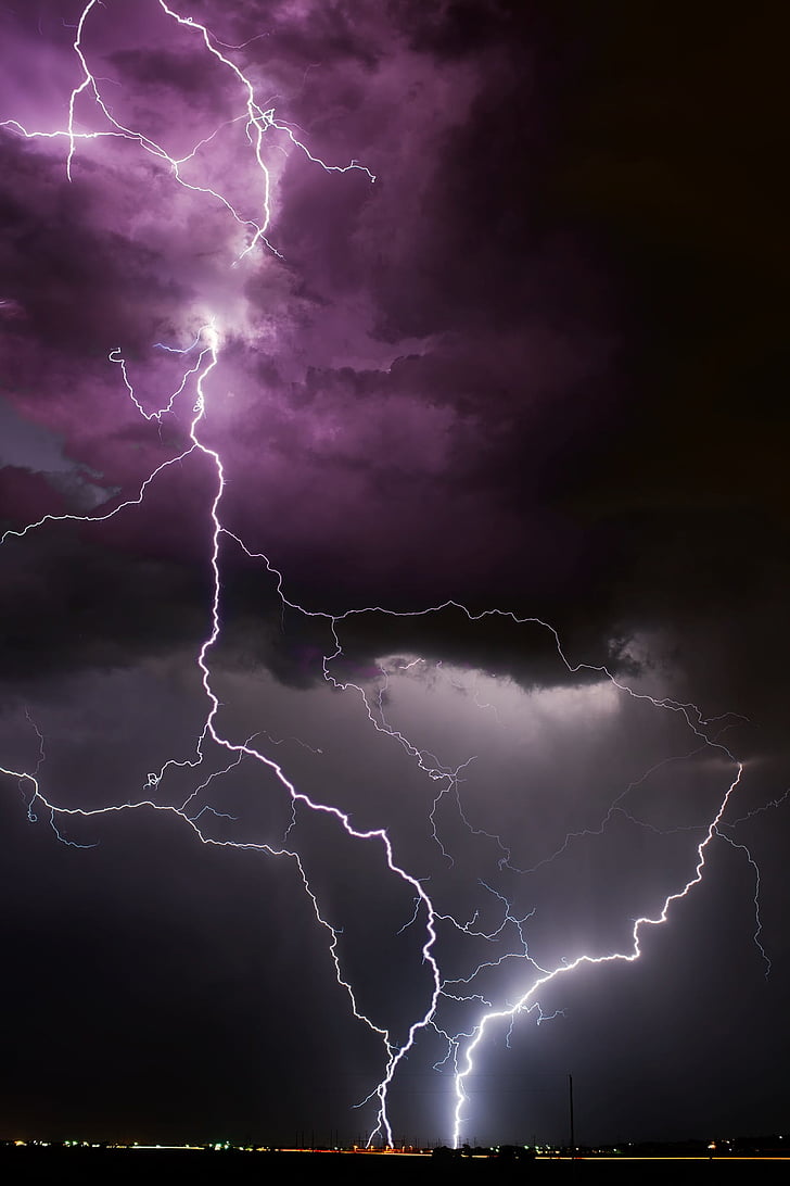 purple clouds and lightning digital wallpaper