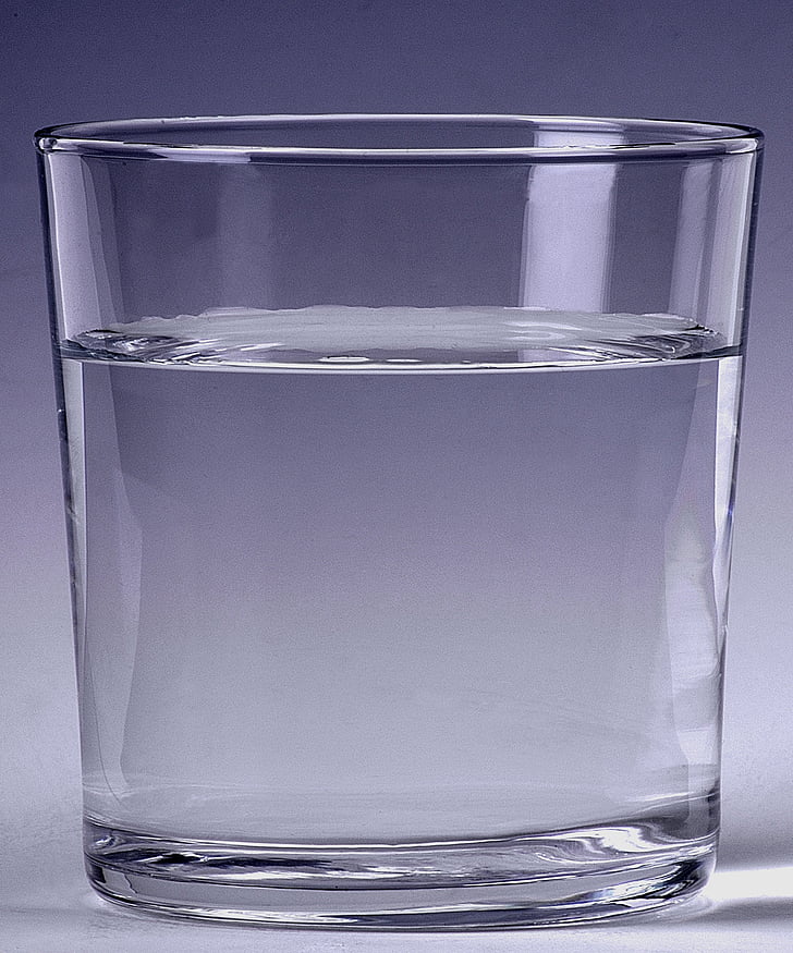 clear drinking glass filled with clear liquid