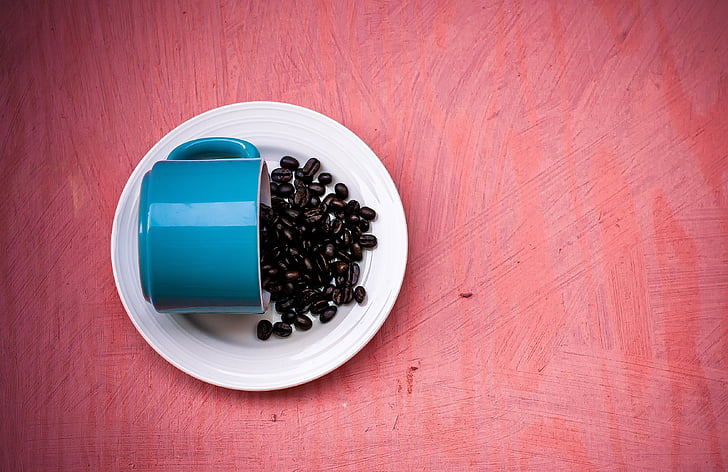 coffee bean serve on white saucer