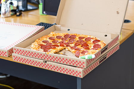 photograph of Kirkland Signature pepperoni pizza in box on table