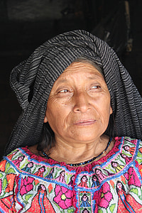 woman with black scarf on head