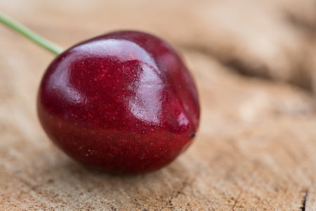 selective focus photography of red fruit