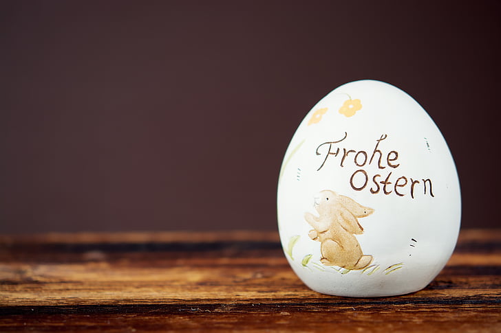 white egg with frohe ostern print