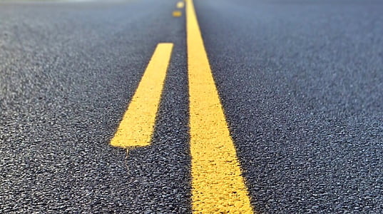 yellow line on gray road