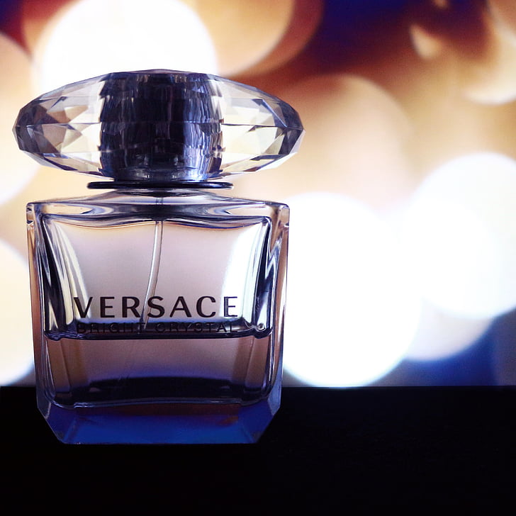 focus photography of Versace fragrance bottle