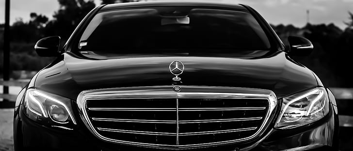 black Mercedes-Benz sedan