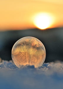 close-up photo of glass ball during golden hour