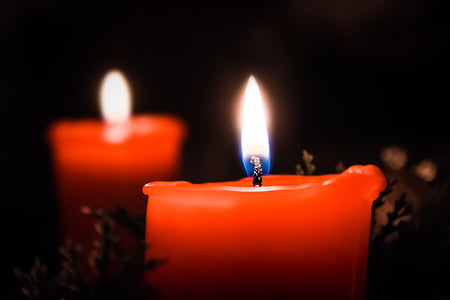 selective focus photo red candle