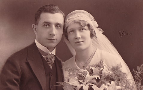 grayscale photo of man and woman