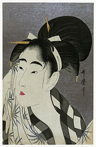 woman wearing gray and white top traditional painting