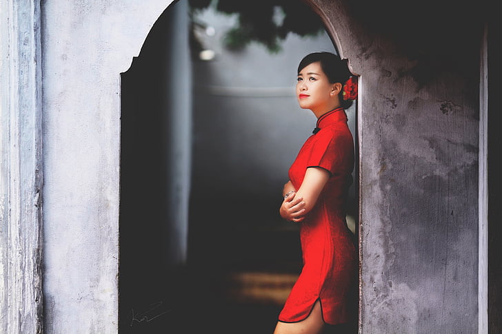 woman wear red short-sleeved mini dress