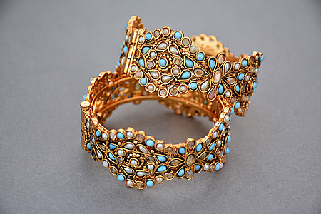 two gold-colored bangles