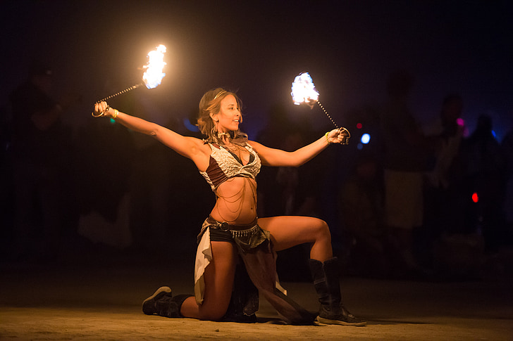 woman having a pyro dance