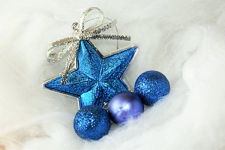 blue baubles on white surface