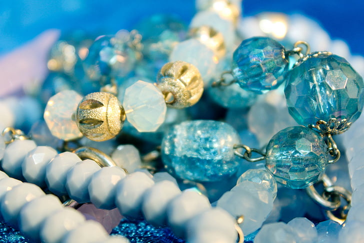 blue gemstones in shallow focus photography