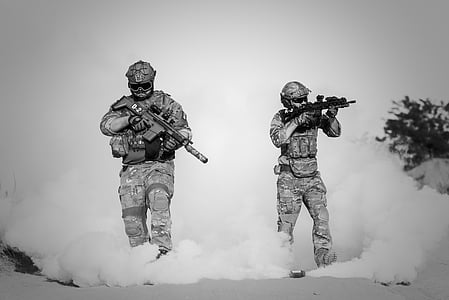 two soldiers holding rifles