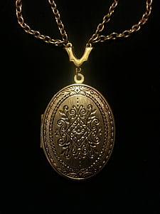 oval gold-colored locket
