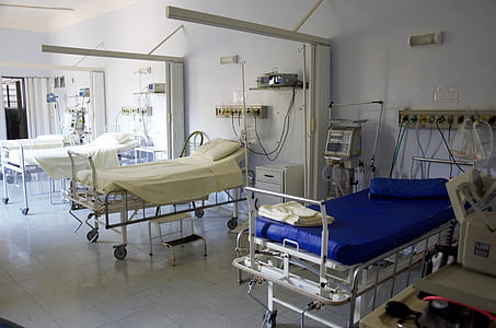 white and blue hospital beds