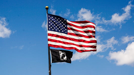 photo of U.S. America Flag on pole during daytime
