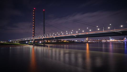 gray bridge during nighttime