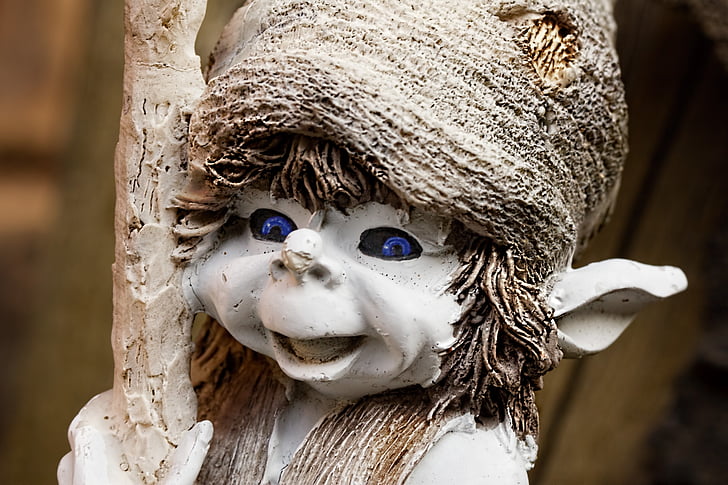 close-up photography of white elf statue