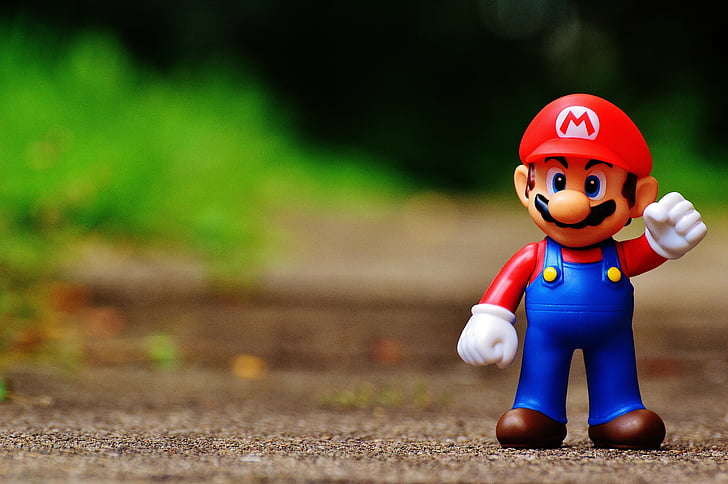 tilt-shift photo of Mario figurine