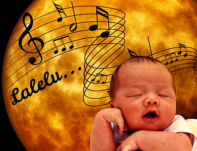 baby sleeping with musical note background