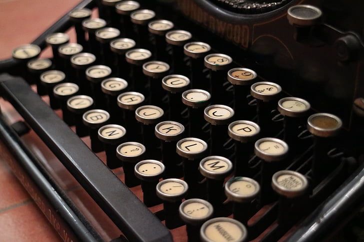 closeup photo black and white typewriter