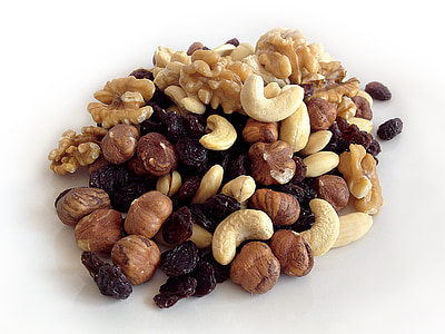 variety of nuts on white surface
