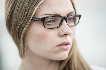 woman wearing black eyeglasses