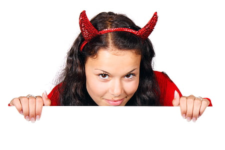 woman wearing red shirt and red devil headband