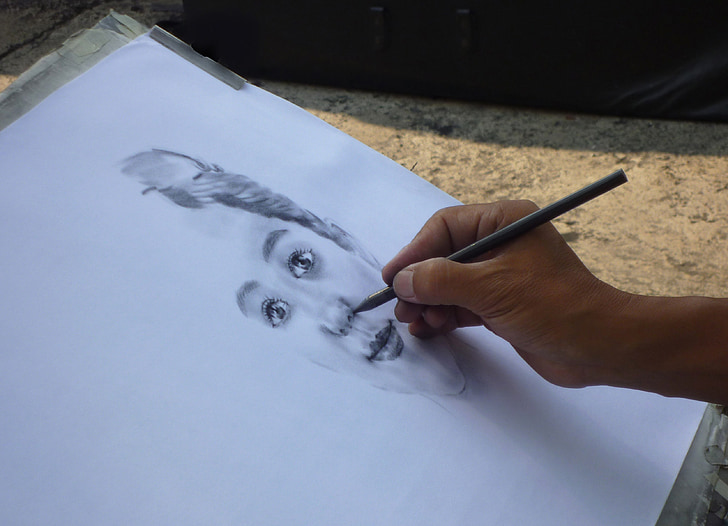 person doing portrait sketch