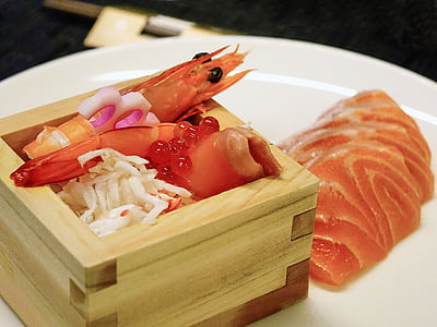 sushi and prawn on white plate