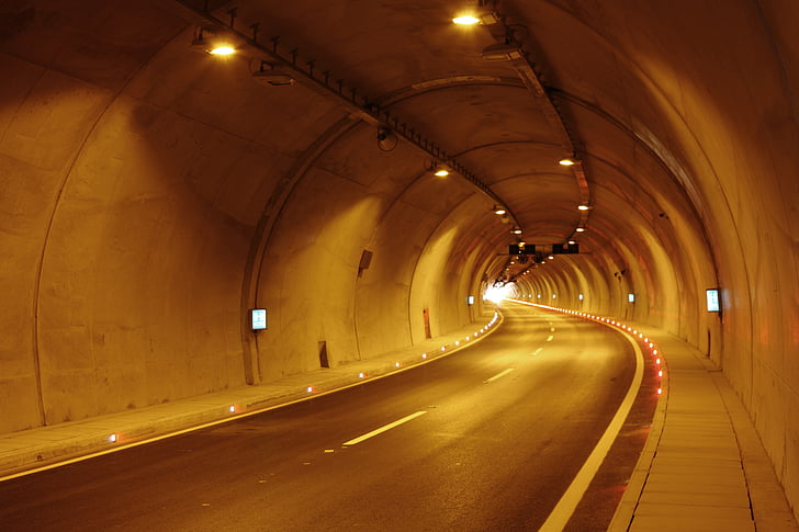 gray tunnel roadway