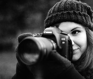 grayscale photo of woman using Canon EOS 5D