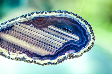blue and grey geode stone in selective-focus photography
