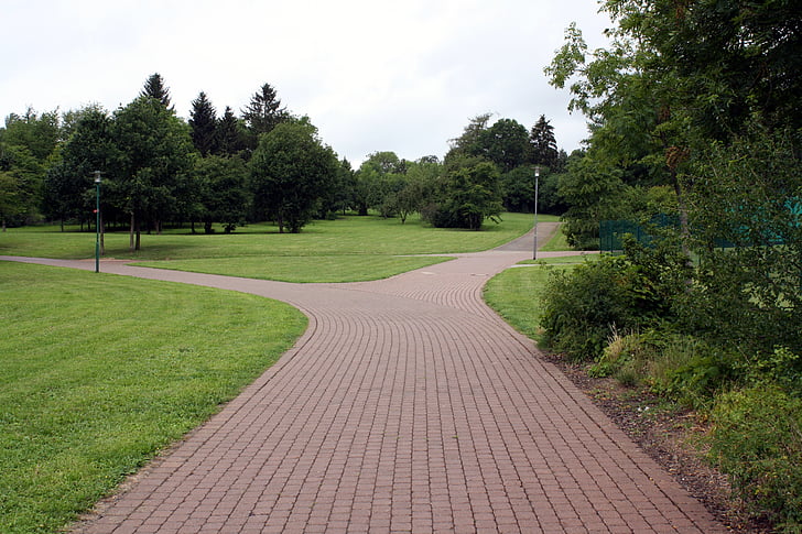 gray concrete pathway at daytime