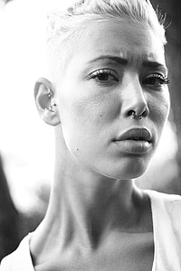 grayscale photography of woman wearing scoop-neck top