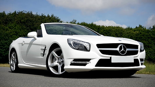 white Mercedes-Benz convertible coupe on road at daytime