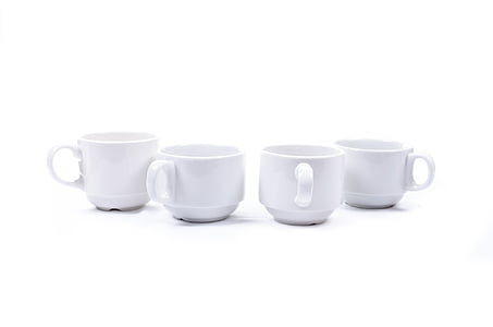four white ceramic cups
