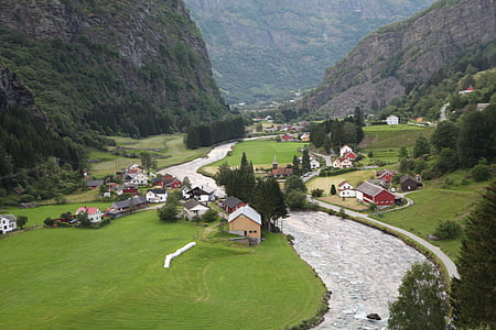 aerial photo of houses near mountain