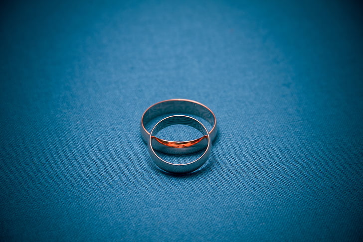 two silver-colored rings