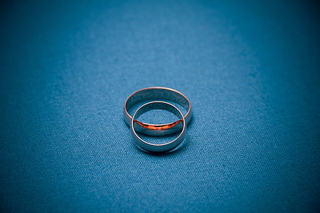 two silver-colored rings