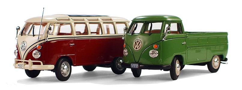 two green and red Volkswagen T1