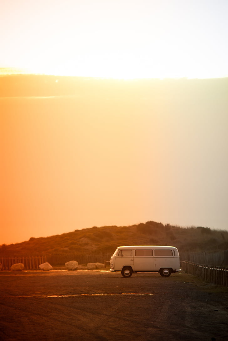 white van under golden hour during daytime