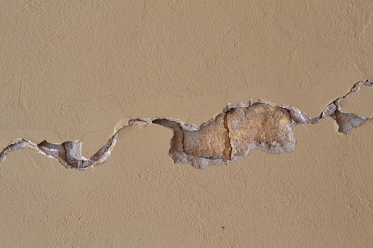 cracked beige wall