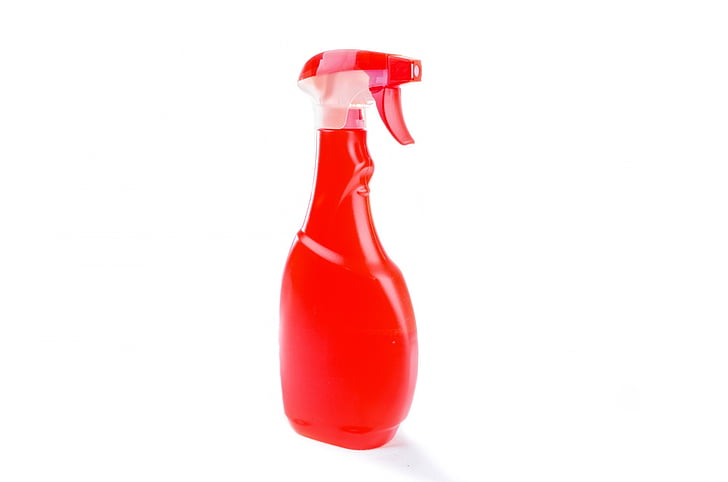 red plastic spray bottle