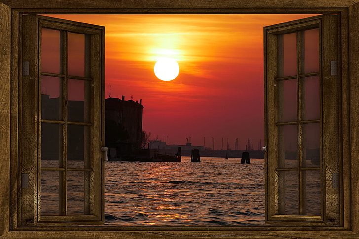 photo of open window displaying golden hour