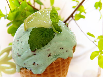 green ice cream with slice lime on top
